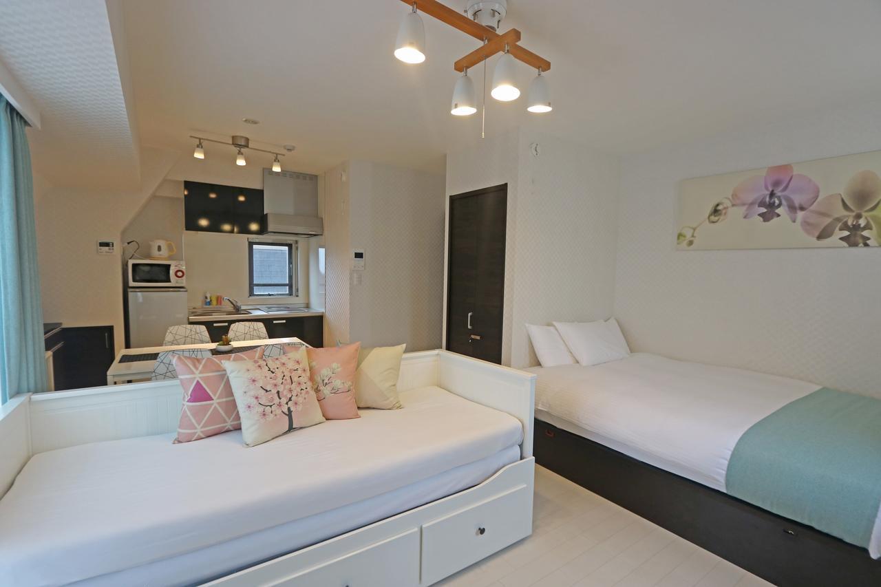 Apartahotel Petit Grande Homes